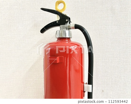 red fire extinguisher red fire extinguisher 112593442