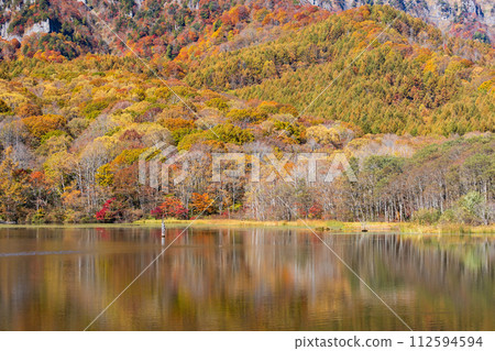 Nagano in autumn, Togakushi and Kagamiike at the peak of autumn leaves Nagano in autumn, Togakushi and Kagamiike at the peak of autumn leaves 112594594