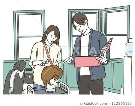 A female hairdresser is taught haircutting techniques by a male hairdresser using a hair mannequin. A female hairdresser is taught haircutting techniques by a male hairdresser using a hair mannequin. 112595153