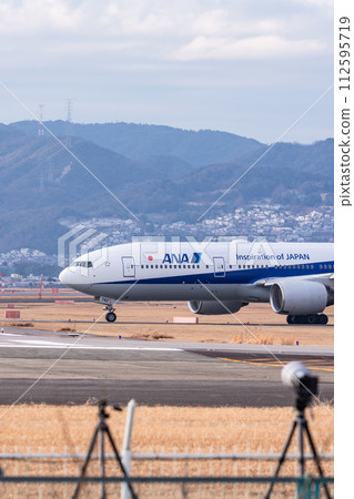 Taxiing scene at Itami Airport Taxiing scene at Itami Airport 112595719
