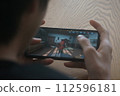 man playing online games 112596181