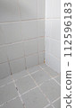 moldy tile wall 112596183