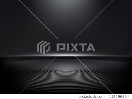 Modern display on a black ripple surface with lighting effect on dark background, enhancing contrast and spotlighting your centerpiece 112596894