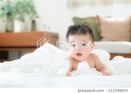 4 month old boy lying face down 4 month old boy lying face down 112598033