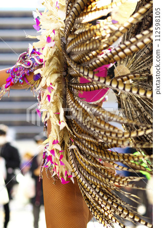 Brazilian costumes dancing samba on the streets of the city 112598105