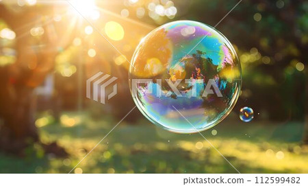 Colorful soap bubble floating gently in warm sunlight. outdoor fun and childhood nostalgia. beautiful, delicate, and vibrant. captured in high detail against a blurred natural background. AI 112599482