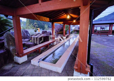 Footbath with natural hot spring water next to the roadside station Footbath with natural hot spring water next to the roadside station 112599782