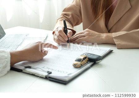The car dealer provides advice on loans, insurance details, and car rental information, and delivers the car with the keys after the rental contract is signed 112599930