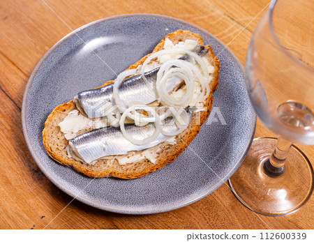 Sandwich with herring fish and butter Sandwich with herring fish and butter 112600339