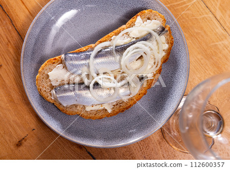 Sandwich with herring fish and butter Sandwich with herring fish and butter 112600357