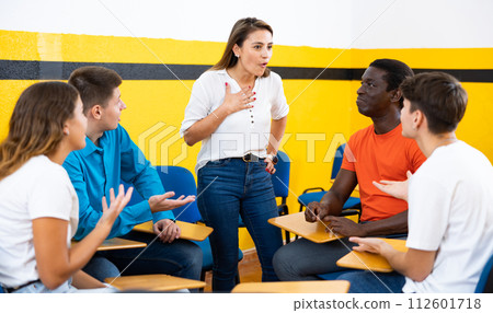 Woman training oral skills in speaking club 112601718