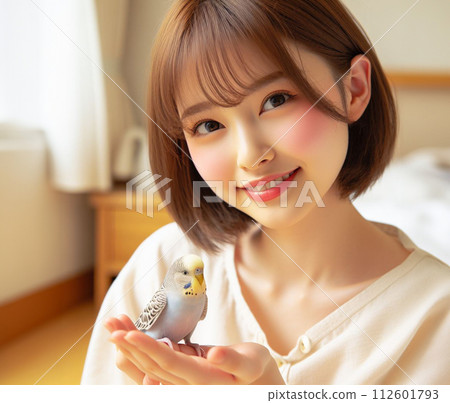 A girl who loves a parakeet 112601793