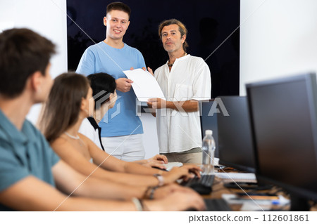 Among students of computer courses, male teacher awards diploma and to excellent guy pupil Among students of computer courses, male teacher awards diploma and to excellent guy pupil 112601861