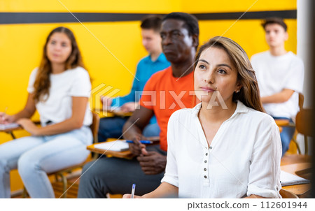 Woman studying in school for taxi drivers Woman studying in school for taxi drivers 112601944