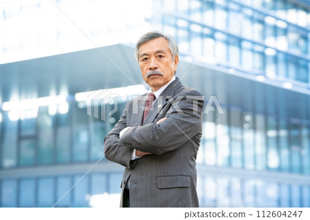 Senior lawyer office district arms crossed 112604247