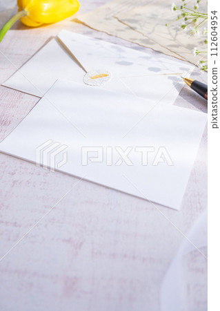 Blank envelope vintage paper tulip gypsophila ribbon Blank envelope vintage paper tulip gypsophila ribbon 112604954