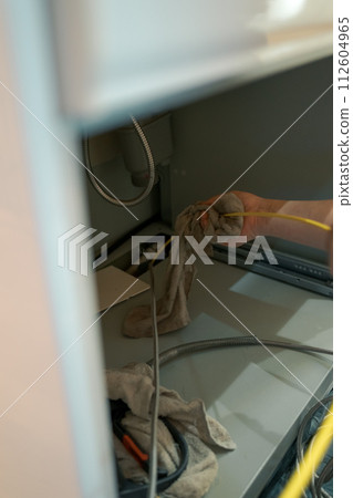 Clog under the sink 112604965
