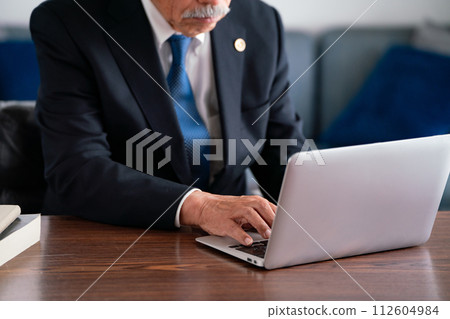 Senior lawyer office desk work faceless Senior lawyer office desk work faceless 112604984