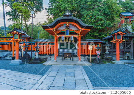 The approach to Fushimi Inari Shrine in Kyoto in the early morning The approach to Fushimi Inari Shrine in Kyoto in the early morning 112605600