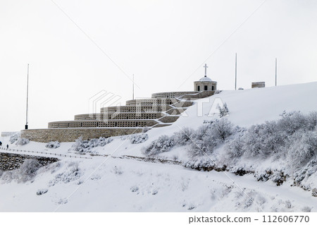 Mountain winter landscape. Mount Grappa war memorial building view 112606770