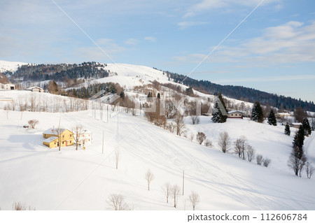 Winter landscape with curvy road 112606784