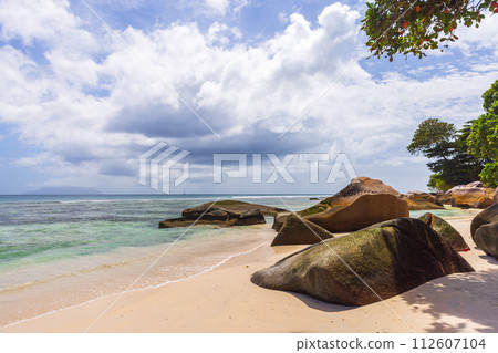 Seychelles. Coastal view with white sand and rocks Seychelles. Coastal view with white sand and rocks 112607104