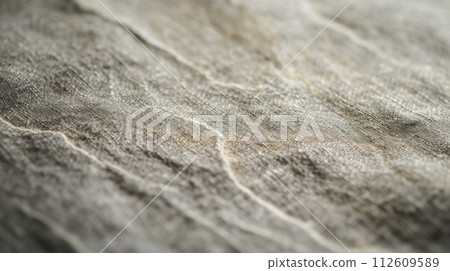 Gray coarse fabric texture with selective focus and space for text. 112609589