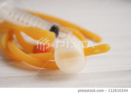 Foley catheter and urine drainage bag collect urine for disability or patient in hospital. 112610104