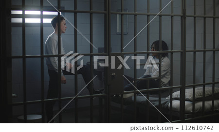Multiethnic teenage prisoners serve imprisonment term in jail Multiethnic teenage prisoners serve imprisonment term in jail 112610742