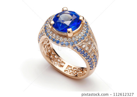 Golden ring with diamonds and blue sapphires closeup. Precious gems and metals, natural gemstone jewelry 112612327