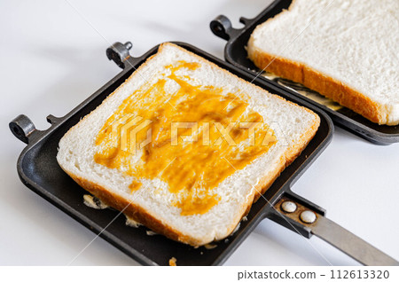 Honey mustard spread on bread Honey mustard spread on bread 112613320