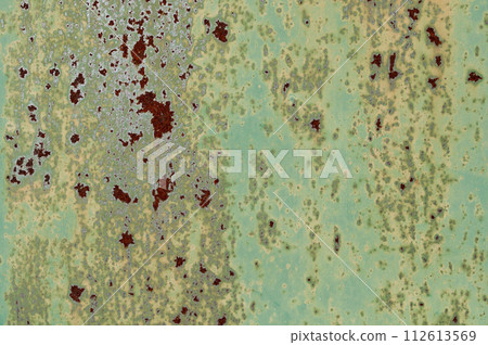 Green sheet of iron with rust spots 112613569