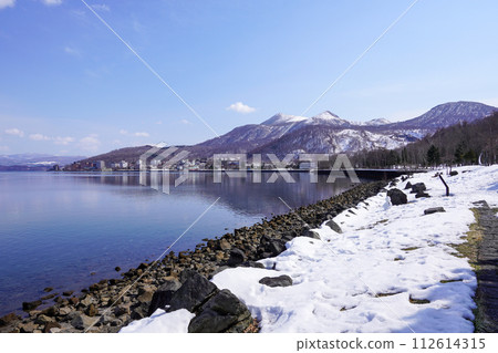 Lake Toya hot spring town seen from Chinkojima Park 112614315