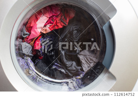 a close view of domestic washing machine at work a close view of domestic washing machine at work 112614752