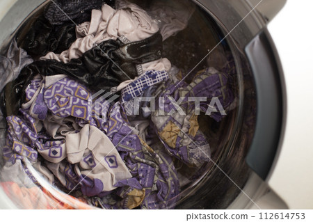 a close view of domestic washing machine at work a close view of domestic washing machine at work 112614753