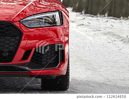 Modern red car lights, sportcar driving on the road,  city car background 112614858