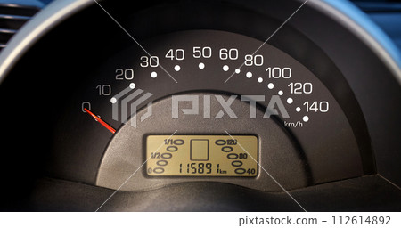 Car speedometer and sensors on a control panel background, car elements close view Car speedometer and sensors on a control panel background, car elements close view 112614892