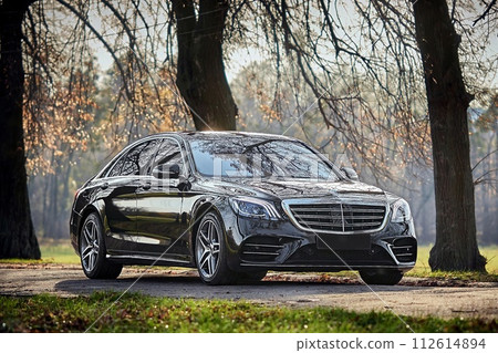 Modern car driving through the woods background, luxury city car wallpaper Modern car driving through the woods background, luxury city car wallpaper 112614894
