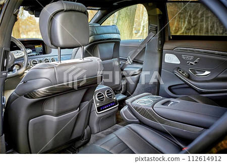 Modern car black leather interior background, inside luxury city car photo Modern car black leather interior background, inside luxury city car photo 112614912