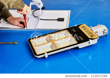 Power saving automatic solar street light, with LED luminary and solar module. 112615100