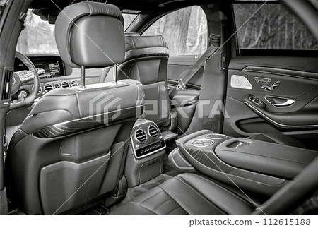 Modern car black leather interior background, inside luxury city car photo Modern car black leather interior background, inside luxury city car photo 112615188