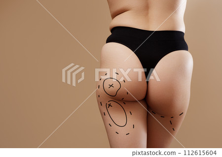 Female body with the drawing arrows. Buttocks, hip Female body with the drawing arrows. Buttocks, hip 112615604