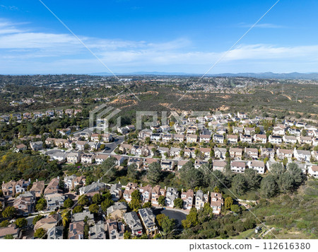 Aerial view of middle class subdivision neighborhood with residential houses in San Diego, California, USA. 112616380