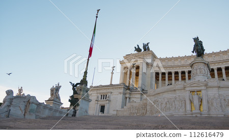 Italian Flag and the glory of Rome monuments Italian Flag and the glory of Rome monuments 112616479
