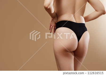 Young pretty plus size or plump woman celebrating Young pretty plus size or plump woman celebrating 112616515
