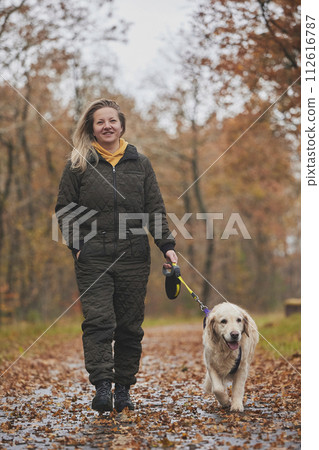 Charming woman walking in the forest in Denmark 112616787
