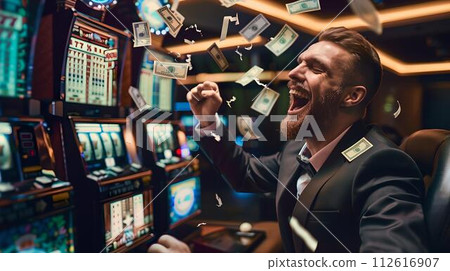 Ecstatic man celebrating win at slot machines in a vibrant casino. high-energy gaming floor atmosphere captured in dynamic photo. lifestyle and leisure in nightlife entertainment. AI 112616907