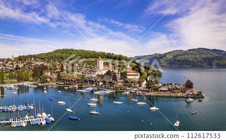 Canton Bern in Switzerland. aerial drone panorama of lake Thun and the Spiez village with medieval castle and old town 112617533