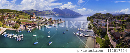 Canton Bern in Switzerland. aerial drone panorama of lake Thun and the Spiez village with medieval castle and old town 112617534