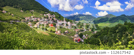 famous wine region in Treviso, Italy. Valdobbiadene hills and vineyards on the famous prosecco wine route. 112617542